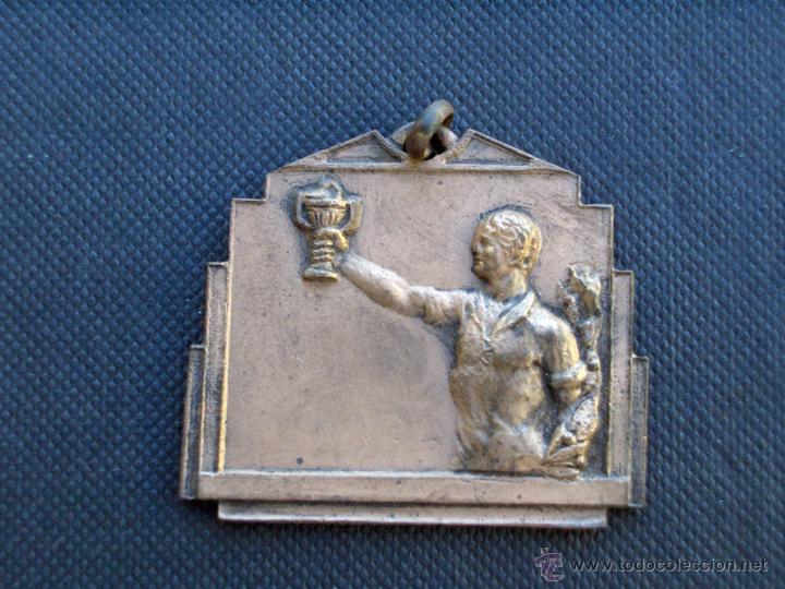 Sports collectibles: Medalla deportiva a&ntilde;os 20-30