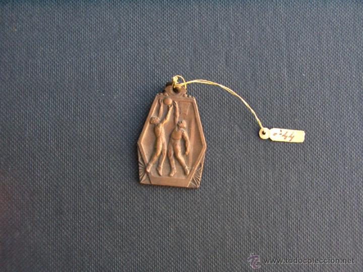 Sports collectibles: Medalla baloncesto