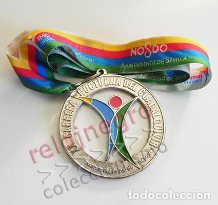 Sports collectibles: MEDALLA DE LA XX CARRERA NOCTURNA DEL GUADALQUIVIR - METAL - SEVILLA - DEPORTE - ANDALUC&Iacute;A