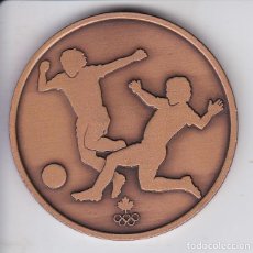 Coleccionismo deportivo: MEDALLA DE LA OLIMPIADA DE MONTREAL DEL AÑO 1976 (FUTBOL) OLIMPYC GAMES DIAMETRO 5CM