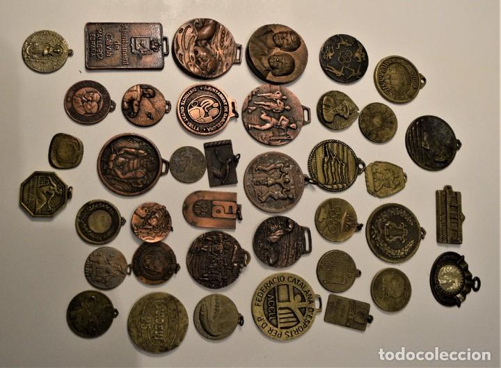 Sports collectibles: lote medallas varias