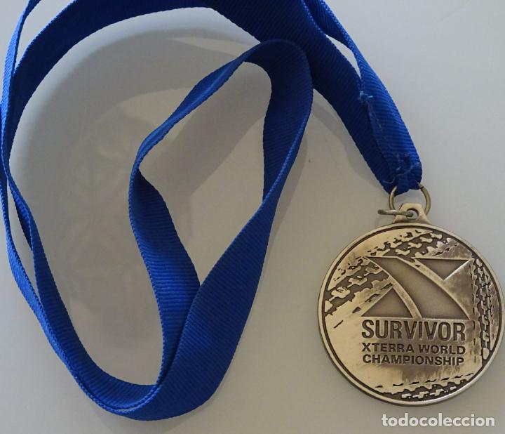 Sports collectibles: MEDALLA DE DEPORTES. TRIATLON DE MONTA&Ntilde;A. MUNDIALES XTERRA SURVIVOR FINISHER 2008. 50GR