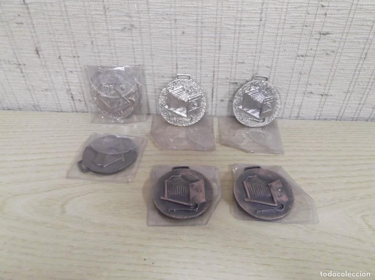 Coleccionismo deportivo: Lote de seis medallas de fotografia.Tres doradas y tres color cobre