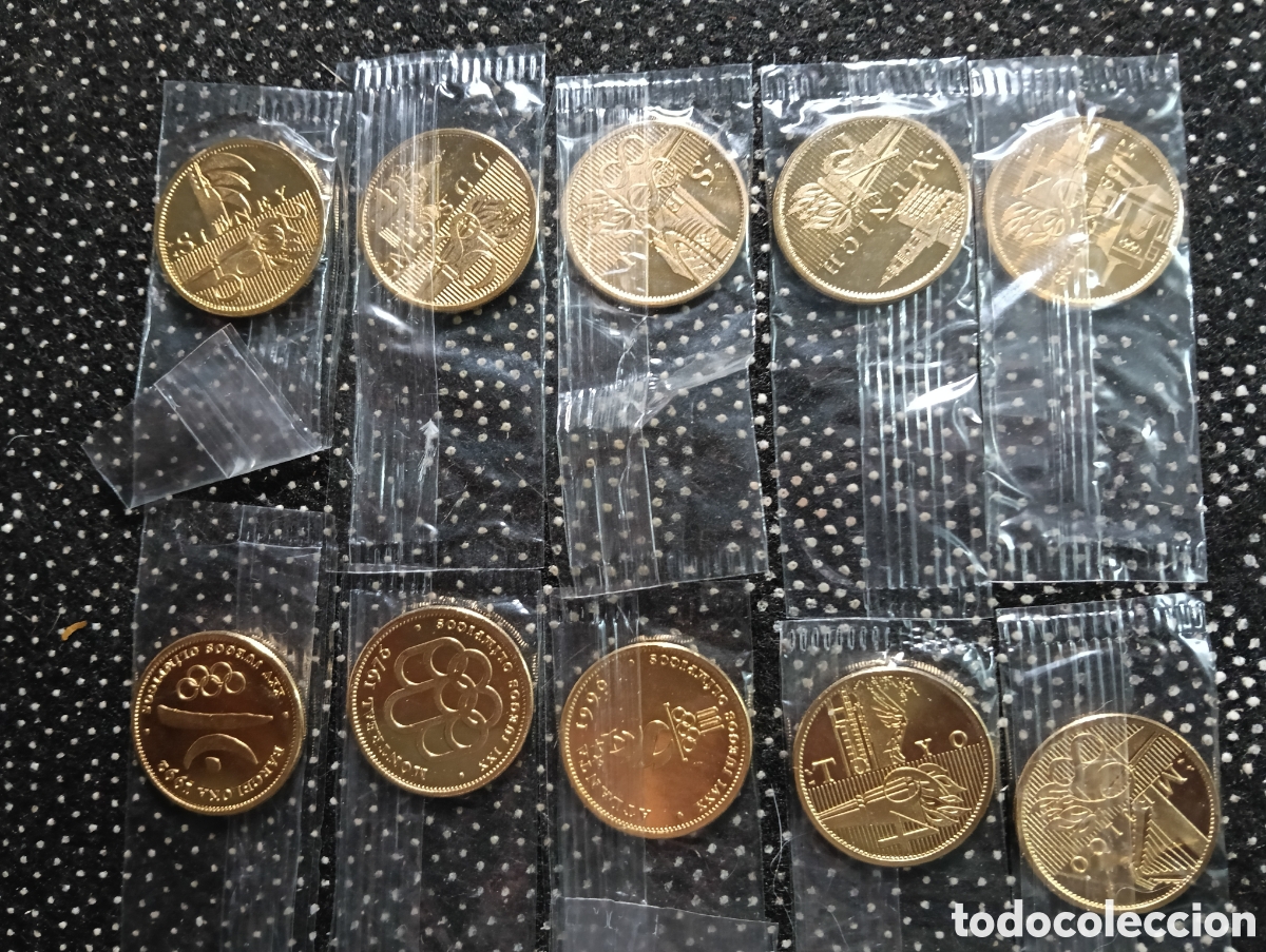 Coleccionismo deportivo: Lote de 10 medallas diferentes conmemorativas de los juegos ol&iacute;mpicos todas en paquete original nuev