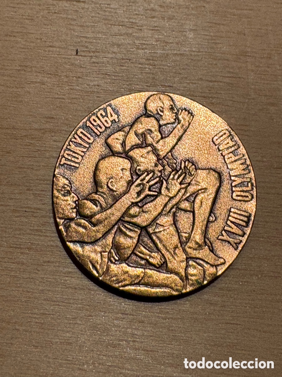 Coleccionismo deportivo: Moneda conmemorativa de los Juegos Ol&iacute;mpicos de Tokio 1964