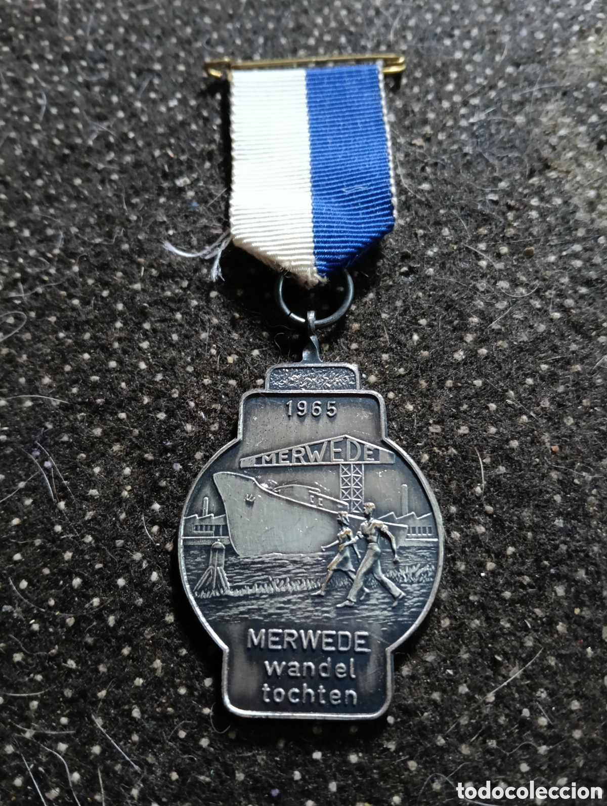 Colecionismo desportivo: Medalla conmemorativa, probablemente de origen holand&eacute;s y fechada en 1965, celebra el evento &rdquo;Merwed