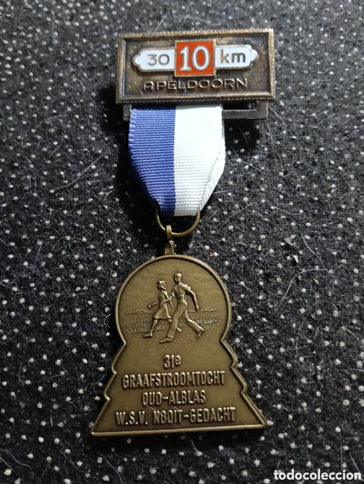 Coleccionismo deportivo: Medalla est&aacute; relacionada con una caminata de 30 km celebrada en Apeldoorn, Pa&iacute;ses Bajos.