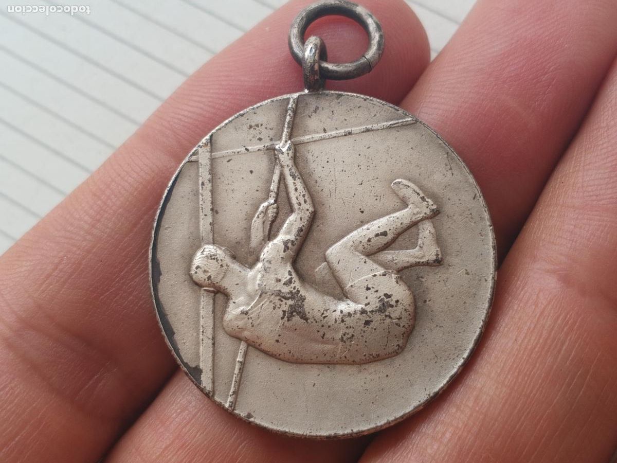 Sammelleidenschaft Sport: Medalla inglesa antigua de salto de p&eacute;rtiga. Plata 1953