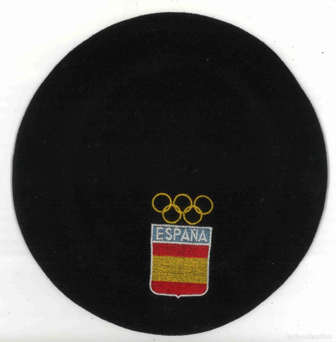 Sports collectibles: Boina txapela con aros ol&iacute;mpicos y emblema de Espa&ntilde;a