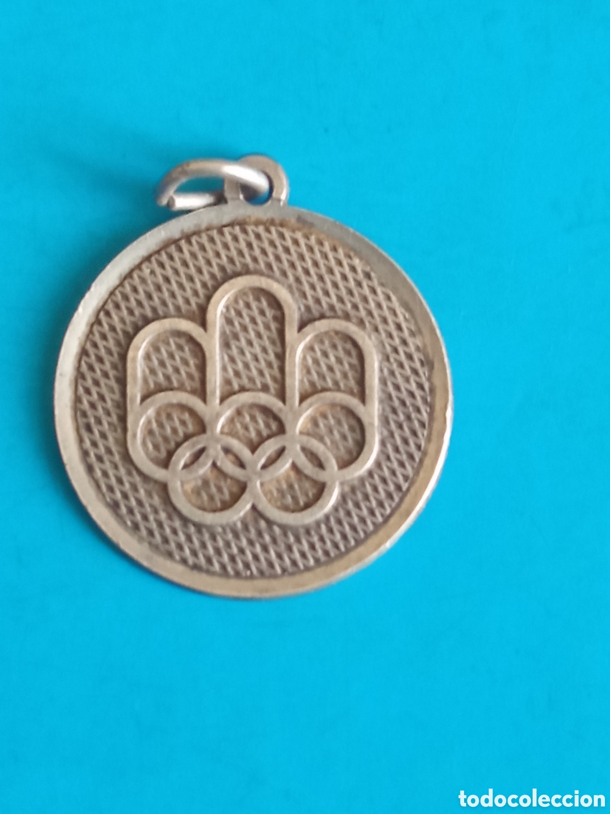 Coleccionismo deportivo: Medalla de las Olimpiadas de Montreal 1972, mide 18 mm de di&aacute;metro