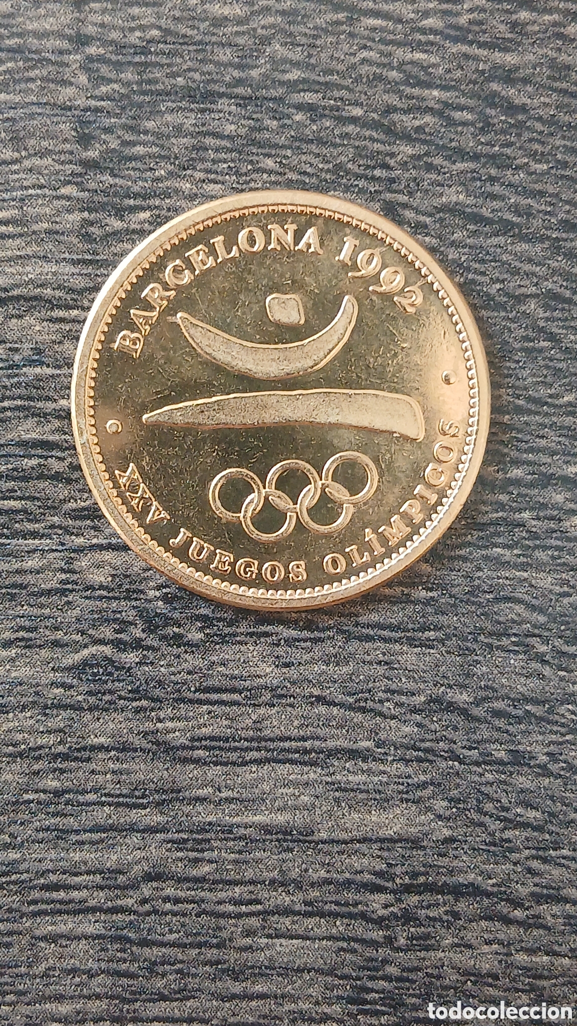 Coleccionismo deportivo: Medalla conmemorativa ba&ntilde;ada en oro de los XX Juegos Ol&iacute;mpicos de Barcelona.