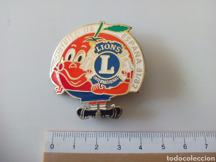 Coleccionismo deportivo: CURIOSO NARANJITO CON ORGANIZACION LIONS INTERNACIONAL