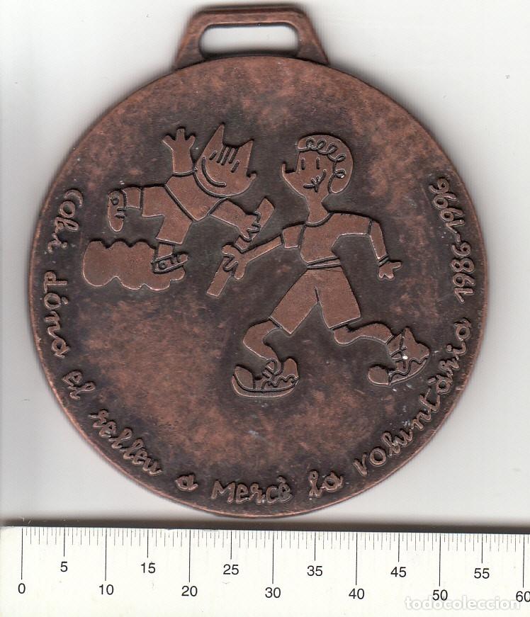 Medallas hist&oacute;ricas: CREXP107 MEDALLA VOLUNTARIOS BARCELONA 1996 COBI 50 GRAMOS 15