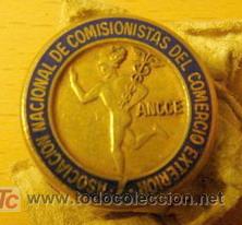 Medallas tem&aacute;ticas: Insignia de la ASOCIACI&Oacute;N NACIONAL DE COMISIONISTAS DEL COMERCIO EXTERIOR.