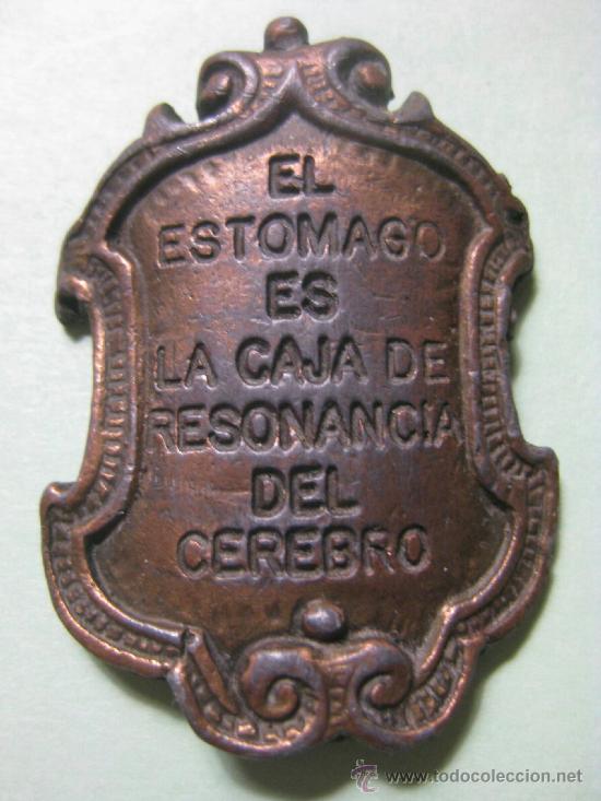 Thematic medals: MEDALLON EL ESTOMAGO ES LA CAJA DE RESONANCIA DEL CEREBRO