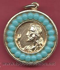 Thematic medals: RARA MEDALLA DORADA CON PIEDRAS AZULES