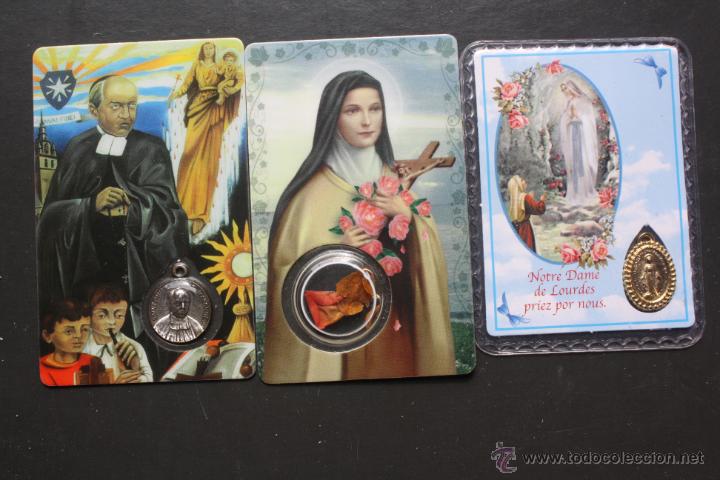Medaglie tematiche: Dos medallitas, una de Lourdes, mas una hojita de una Santa.