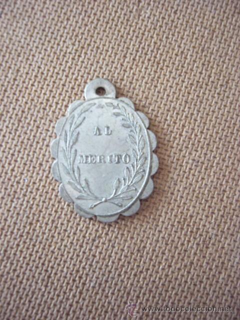Medalhas tem&aacute;ticas: MEDALLA AL MERITO EN METAL.  3 CM ALT.