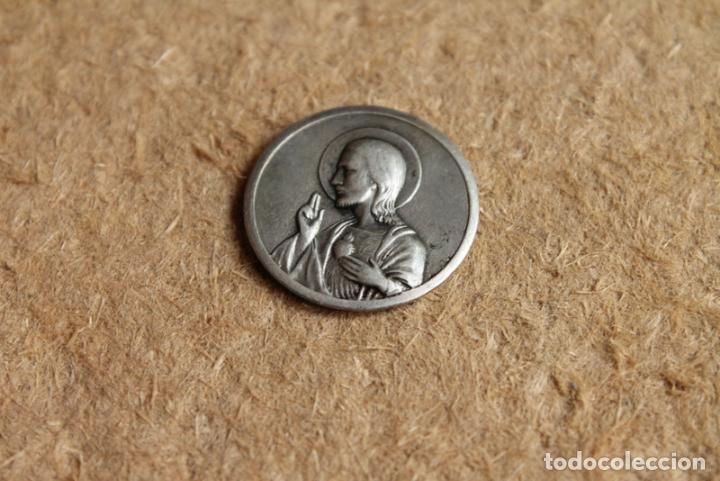 Medaglie tematiche: Medalla de tema religioso.