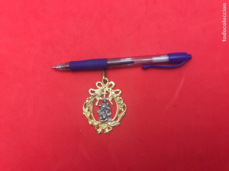 Medaglie tematiche: Medalla de la piedad en plata chapada oro 6x4,5cm
