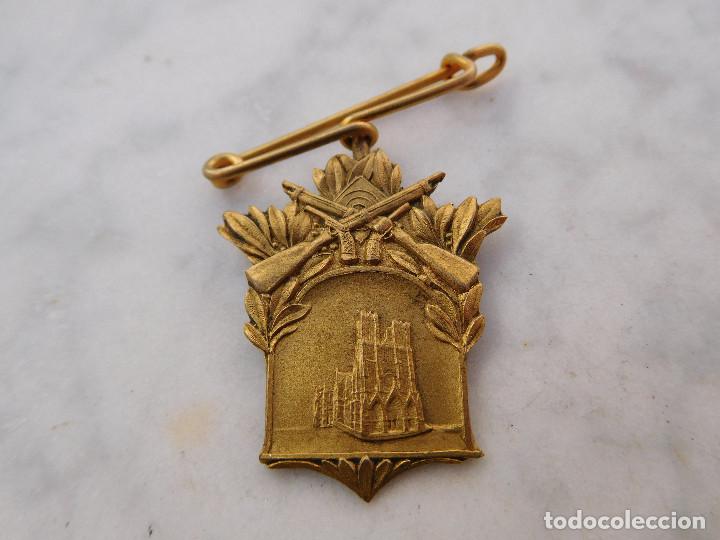 Thematische Medaillen: Medalla antigua de tiro