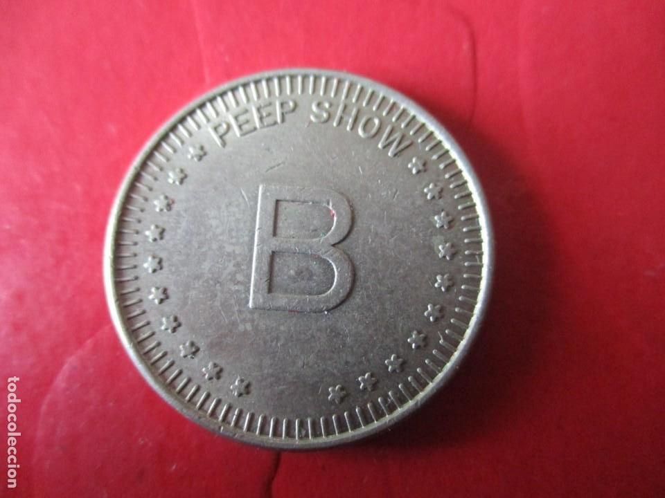 Medallas tem&aacute;ticas: Ficha para entrada al peep Show