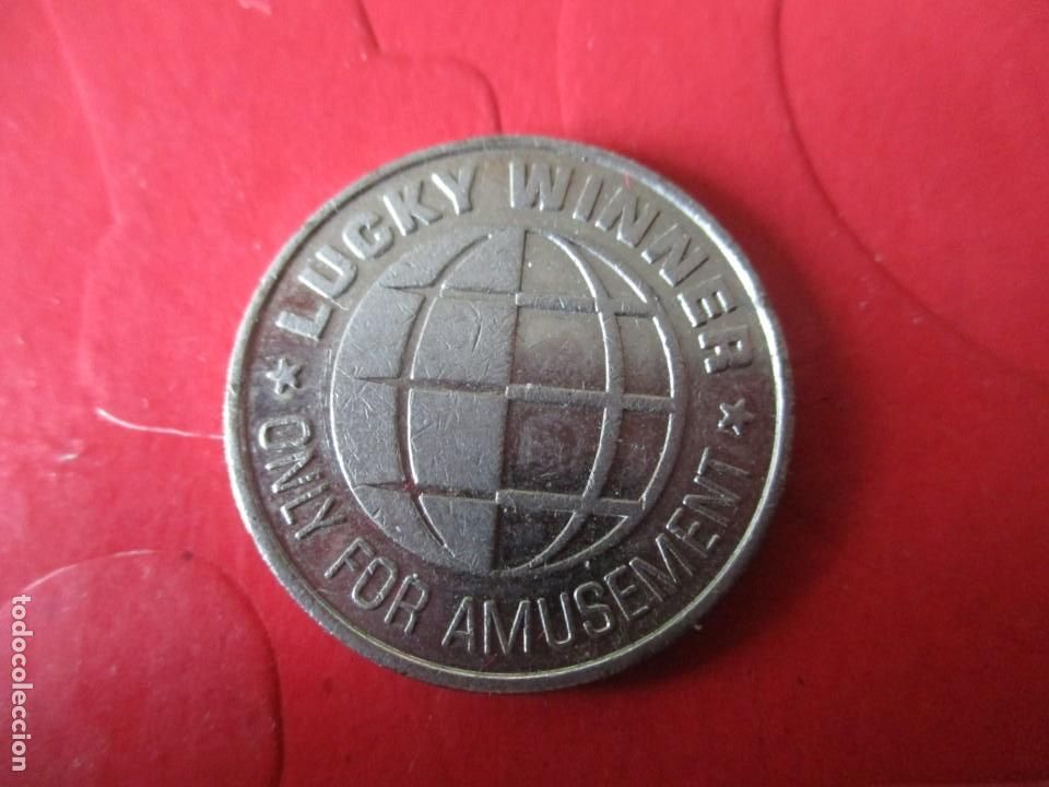 Medallas tem&aacute;ticas: ficha de Casino