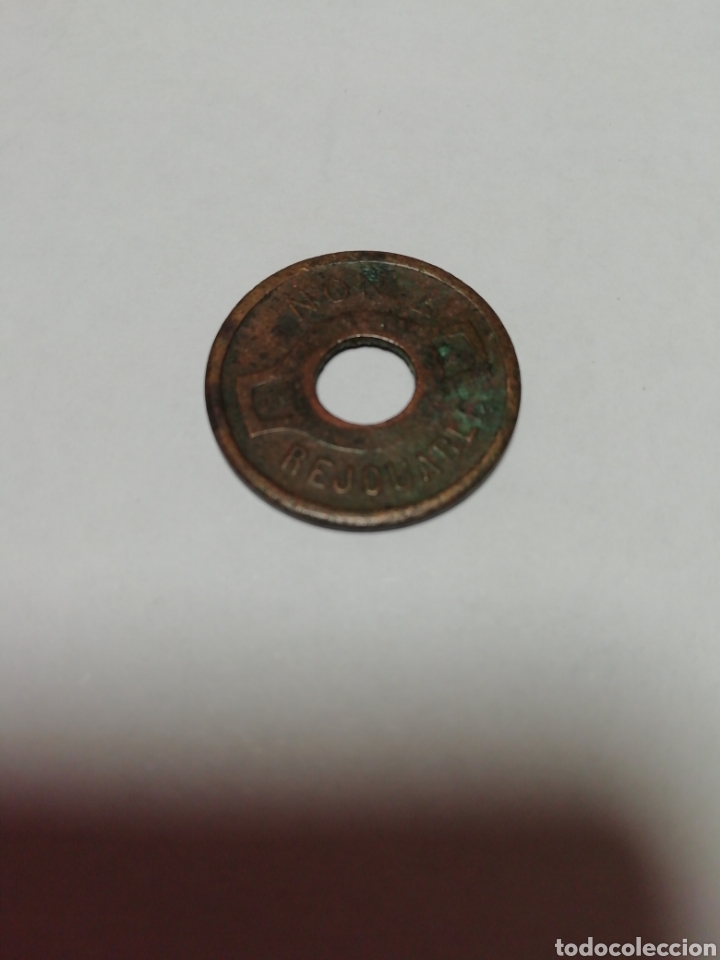 Thematic medals: Antigua ficha dineraria a identificar