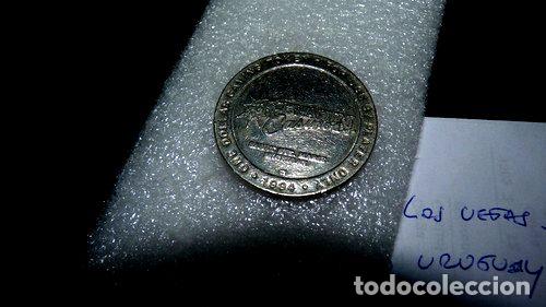 M&eacute;dailles th&eacute;matiques: ficha grande 1 dolar michigan 1994