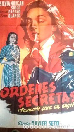 Medallas tem&aacute;ticas: afiche de cine ordenes secretas n75