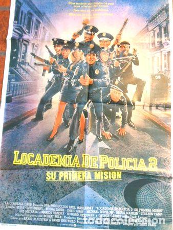 Medaglie tematiche: afiche de cine locademia de policia 2
