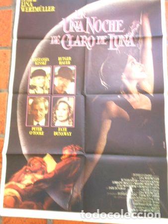 Thematische Medaillen: afiche de cine una noche de claro de luna n79