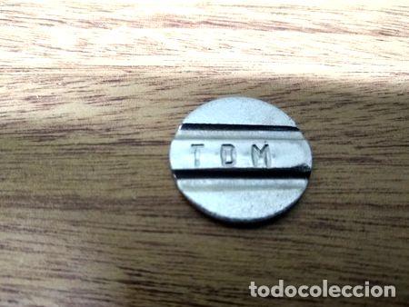 M&eacute;dailles th&eacute;matiques: ficha cospel con ranuras y tres iniciales grabadas tdm