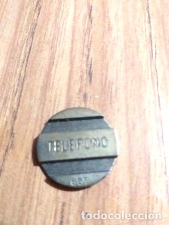 Medalhas tem&aacute;ticas: antigua ficha cospel entel telefono