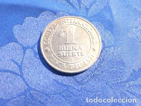 Medallas tem&aacute;ticas: ficha casino hotel conrad de 1 dolar para maquinas 2009