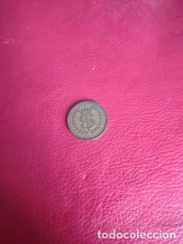 Thematic medals: antigua ficha de casino