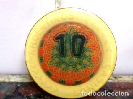 M&eacute;dailles th&eacute;matiques: ficha casinos argentinos valor 10