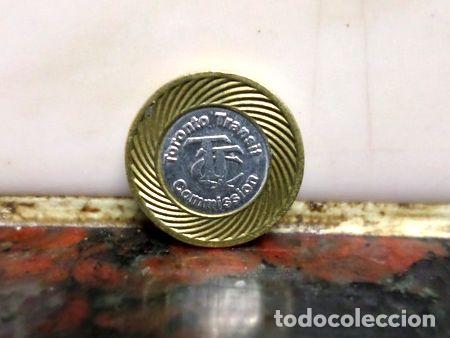 M&eacute;dailles th&eacute;matiques: ficha transporte one fare toronto transit canada