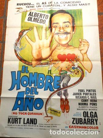 Thematische Medaillen: afiche de cine el hombre del ano a olmedo cod 349