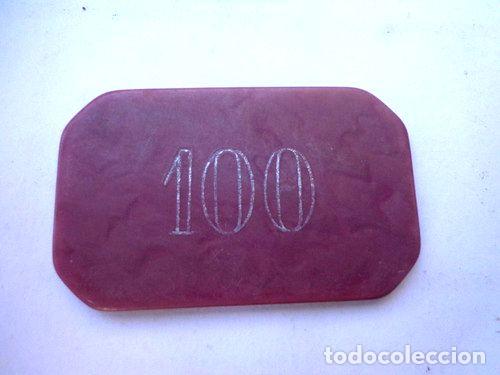 Thematische Medaillen: ficha de casino con valor 100