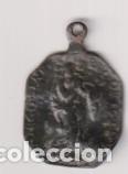 Thematic medals: Inmaculada, alrededor Ley. lat&iacute;n. (AE 27 mms.) R/C&aacute;liz entre dos &aacute;ngeles. superado de cabeza de ange