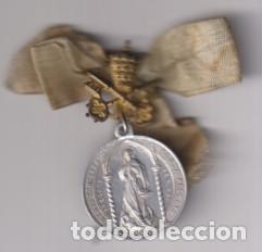 M&eacute;dailles th&eacute;matiques: Inmaculada. (AL 27 mms.) Encima de la argolla escudo papal dorado, Tiara y las llaves de S. Pedro R/
