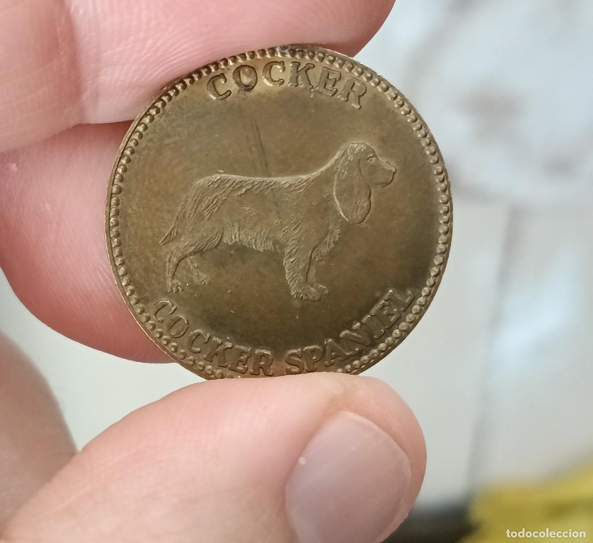 Medallas tem&aacute;ticas: Token. Ficha. Cocker Spaniel. Frolic. Marca de comida para perros. Grupo Mars