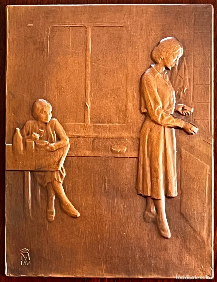 Medallas tem&aacute;ticas: PLACA DE LA F.N.M.T., TITULADA &rdquo;LA COCINA&rdquo;. 1.986,DE BRONCE. MIDE 7 X 9,2 CMS.