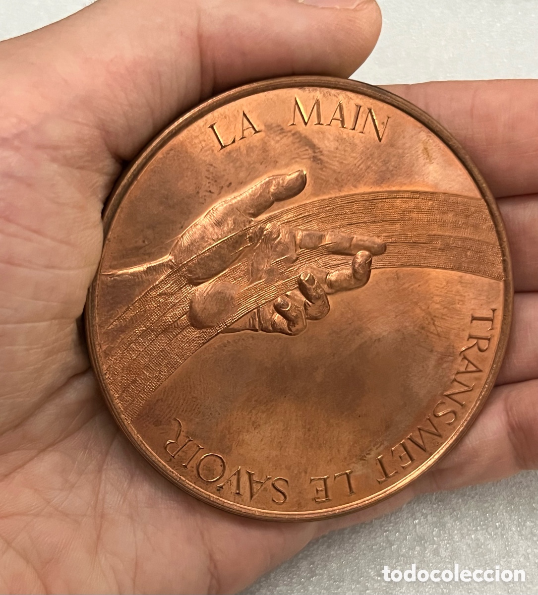 Medallas tem&aacute;ticas: Medalla de cobre - Le Main Transmet Le Savoir