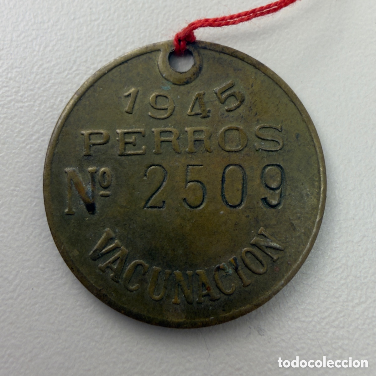 Medallas tem&aacute;ticas: Medalla vacunaci&oacute;n para perros a&ntilde;o 1945. Laboratorio municipal de Madrid.