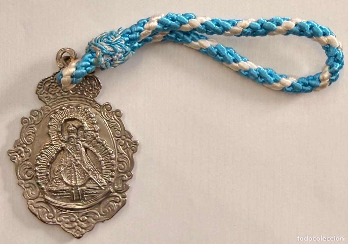 Medallas tem&aacute;ticas: MEDALLA CON CORD&Oacute;N VIRGEN DEL ROCIO CON PUBLICIDAD GAMBRINUS ANDUJAR MEDALLA-1975