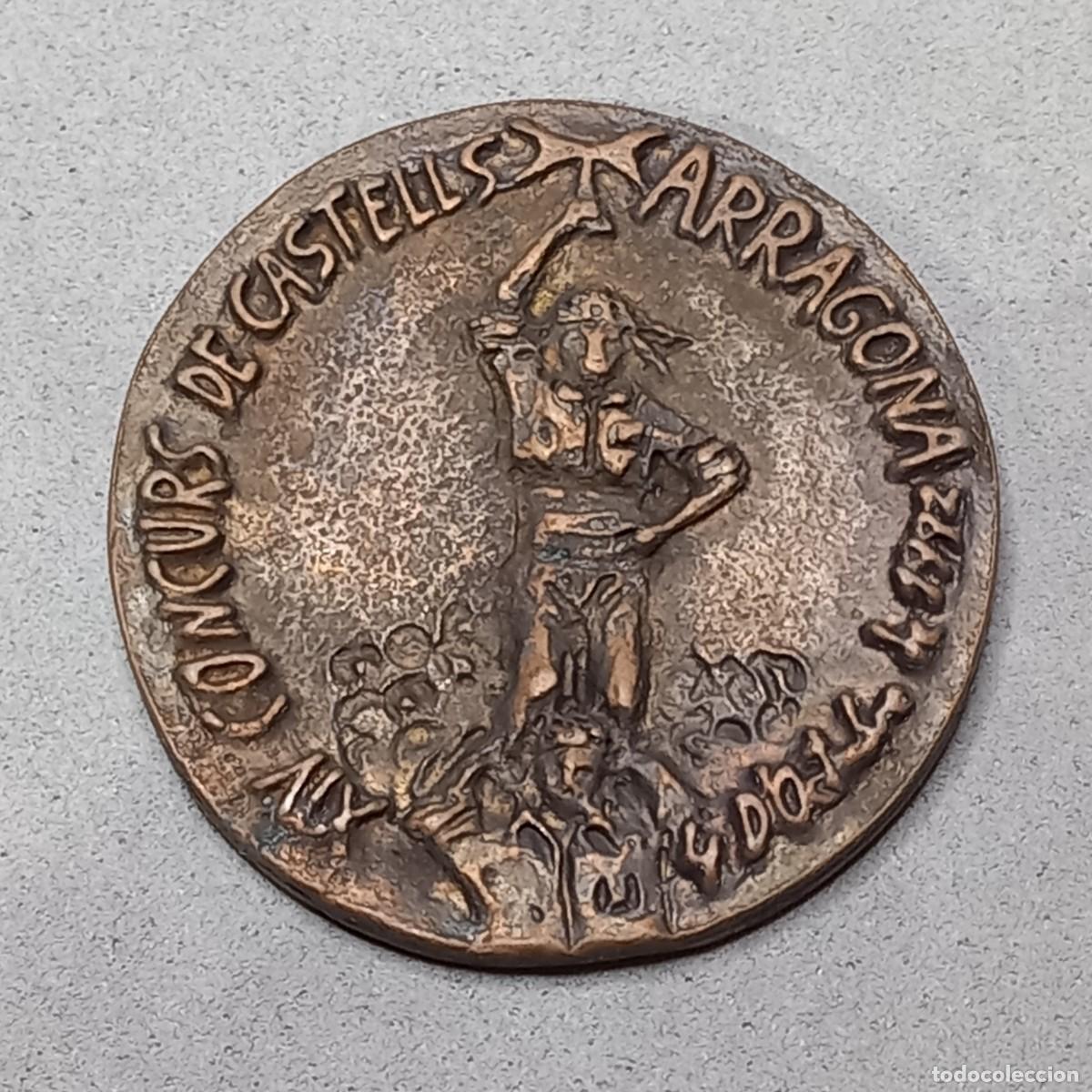 Thematic medals: Medalla conmemorativa. XIV CONCURS DE CASTELLS, TARRAGONA. Artista JOAN SERRAMI&Agrave;. 1992.