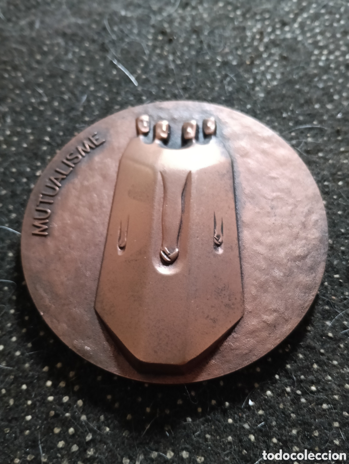 Medallas tem&aacute;ticas: Medalla del centenario del Mutualismo 1902-2002 agrupaci&oacute;n Mutua, mide 7 cm de di&aacute;metro muy pesada.