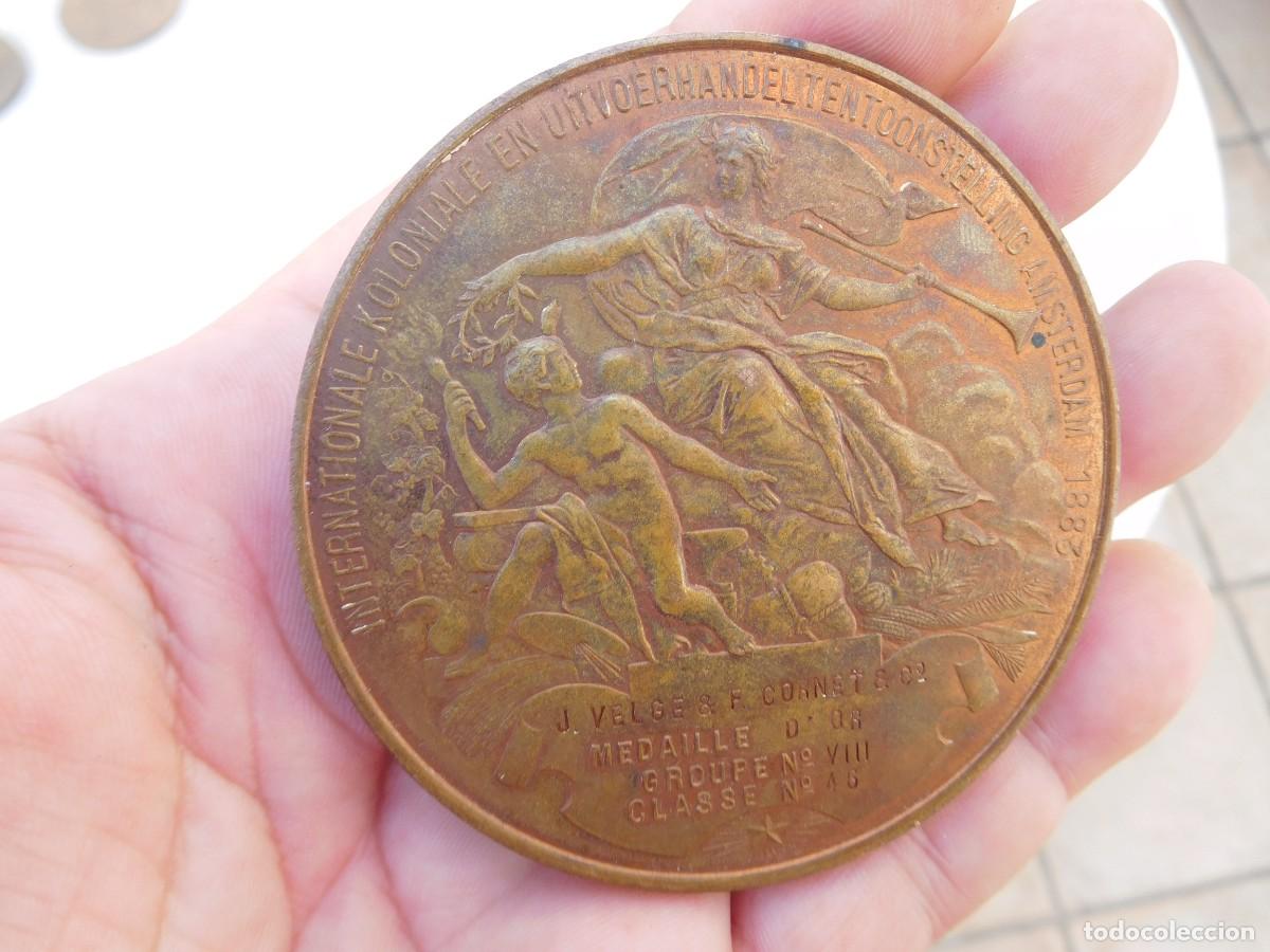 Medaglie tematiche: Medalla de bronce. Exposici&oacute;n internacional y colonial de comercio Amsterdam 1883. A. Fisch